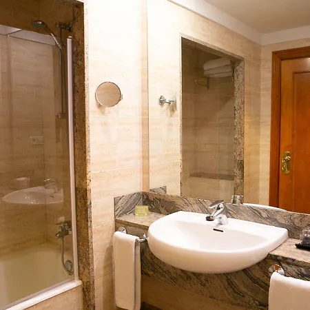 Отель Sercotel Ciudad De 4*