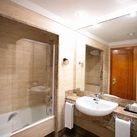 Отель Sercotel Ciudad De